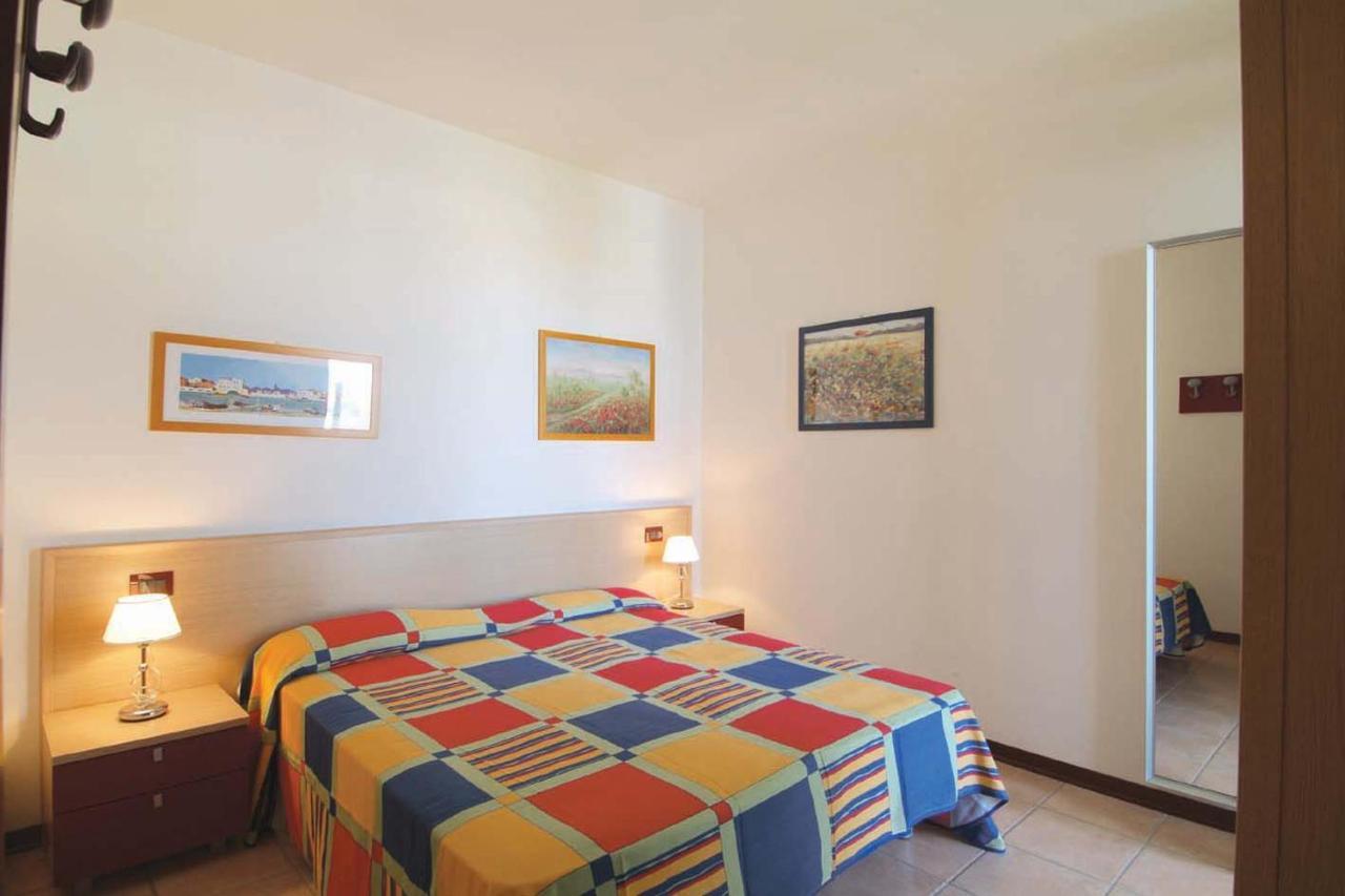 Altanea Apartments Con Piscina Caorle Bagian luar foto